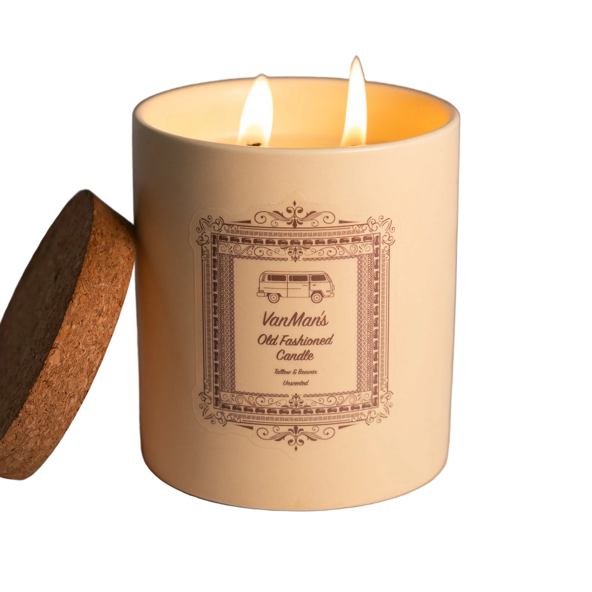 Lit candle in a decorative container with a label on a gray background