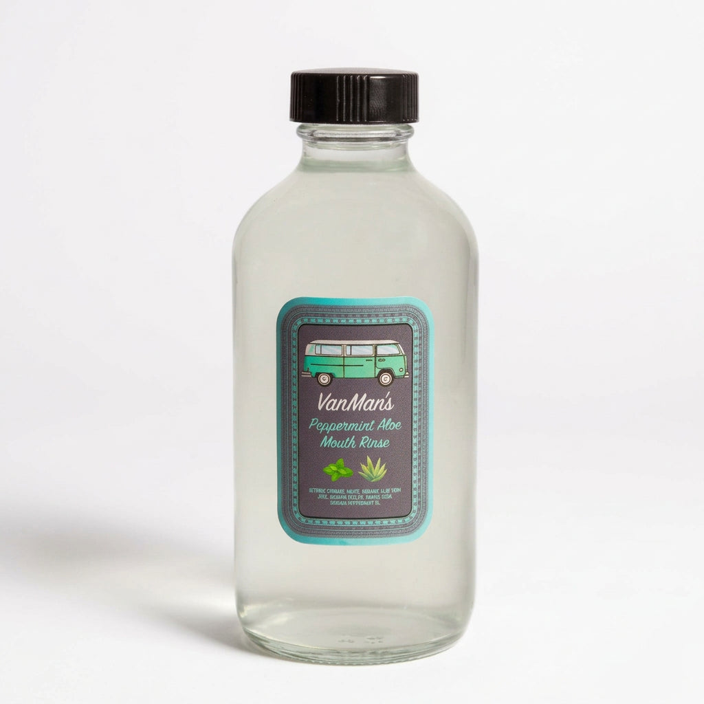 Clear bottle with a black cap and Van Man's label on a light green background