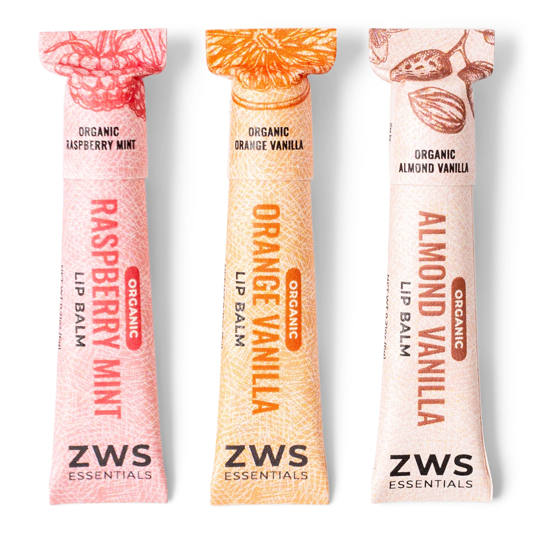 Three ZWS lip balm tubes in raspberry mint, orange vanilla, and almond vanilla flavors on a white background.