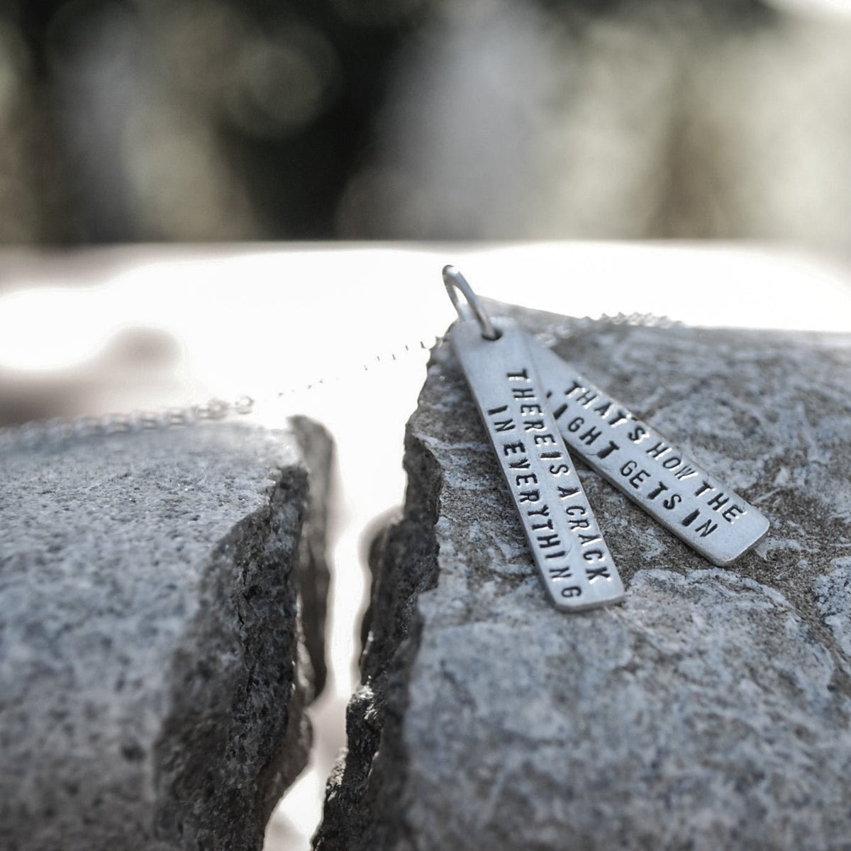 There's a crack in everything; that's how the light gets in - Leonard Cohen Quote Necklace