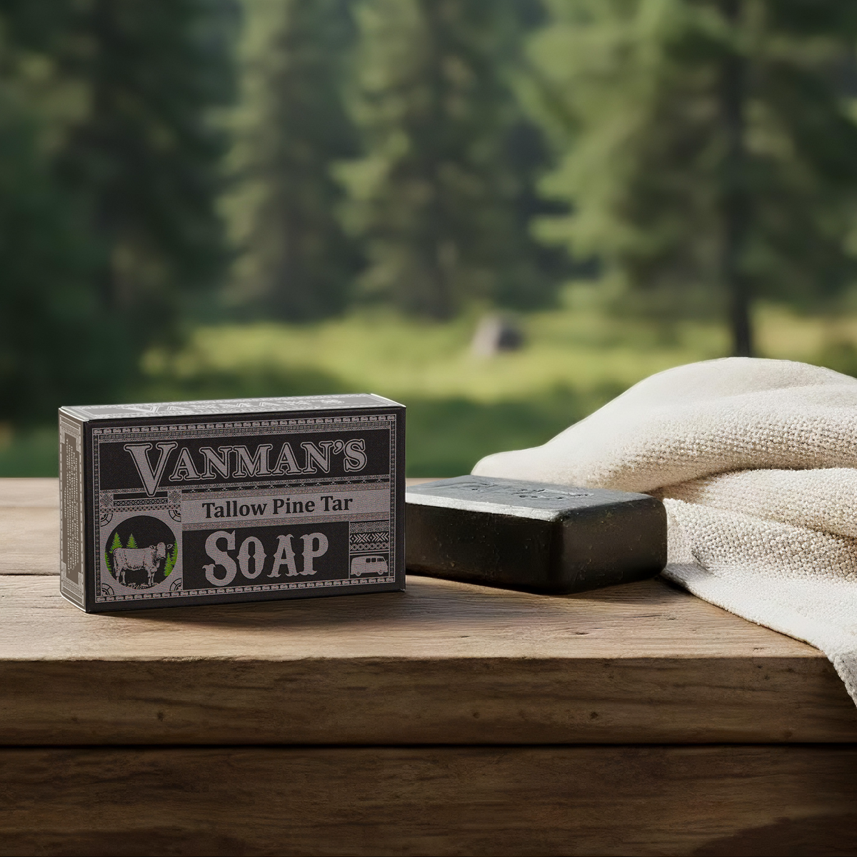Vanman's Tallow Pine Tar Soap with packaging on a wooden surface outdoors.