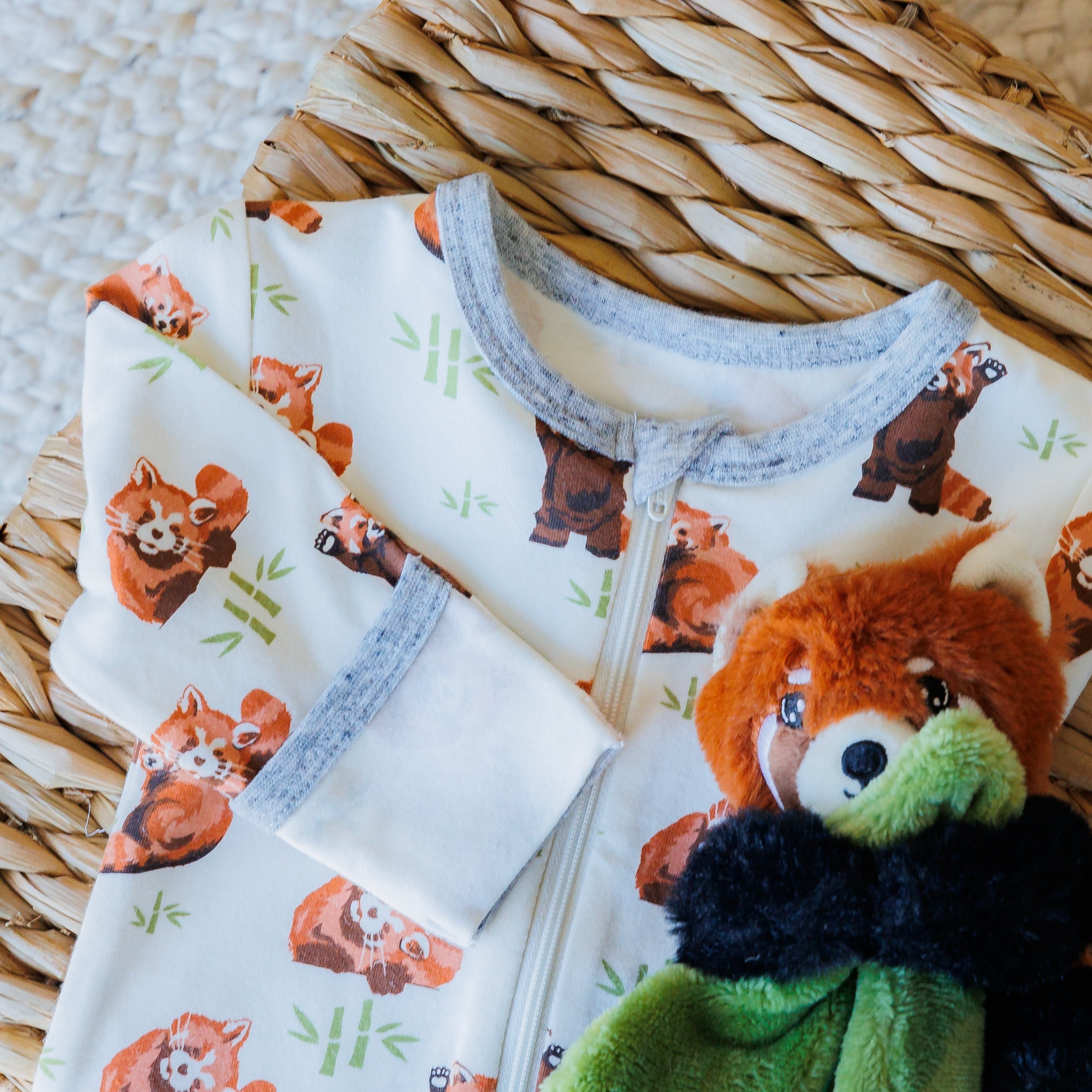 Red Panda printed footie in sustainable fabric