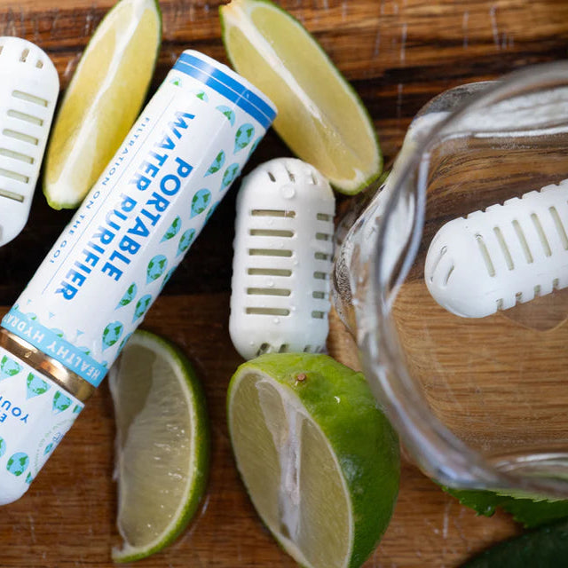Portable diffuser with lime slices on a wooden surface