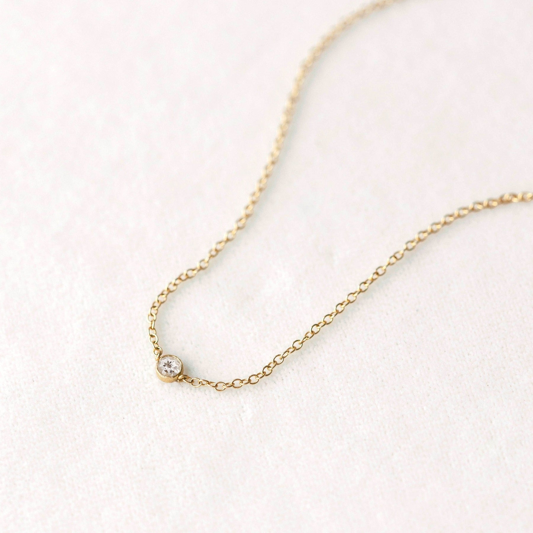 Gold Tiny White Topaz Necklace